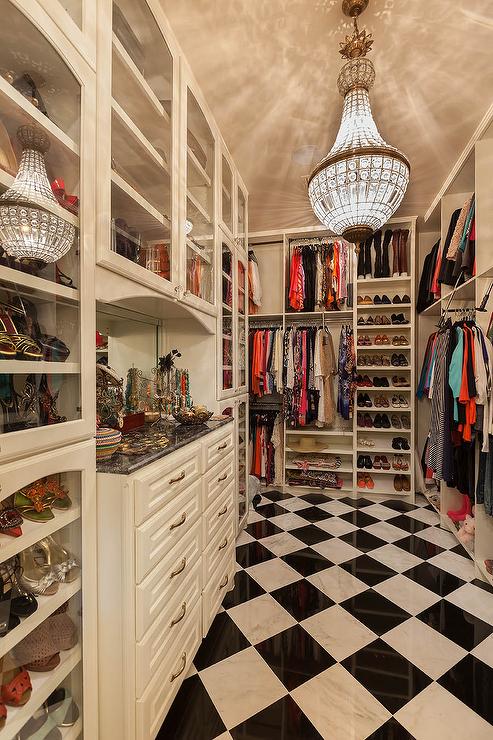 french-closet-chandelier-walk-in-closet-black-and-white-harlequin-tile-floor