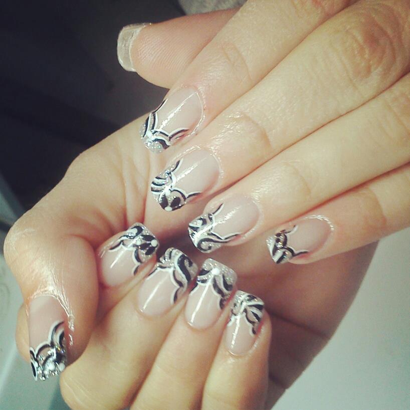 nail art examples with a variety of shapes and patterns