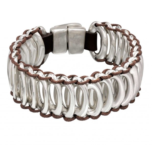 Unique bracelet with silver-plated oval beads joined together by leather strips and a silver-plated clasp. Hand-crafted in Spain. Unique bracelet with silver-plated oval beads joined together by leather strips and a silver-plated clasp. Hand-crafted in Spain.