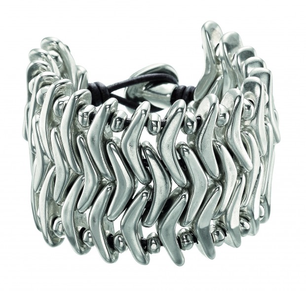 Wide, silver-plated metal bracelet with various interwoven beads, separated by rounded balls.