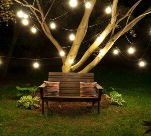 Create Outstanding Outdoor Living Spaces With These Inspiring Ideas. - water, string lights, outdoor, garden, fontain, blinds