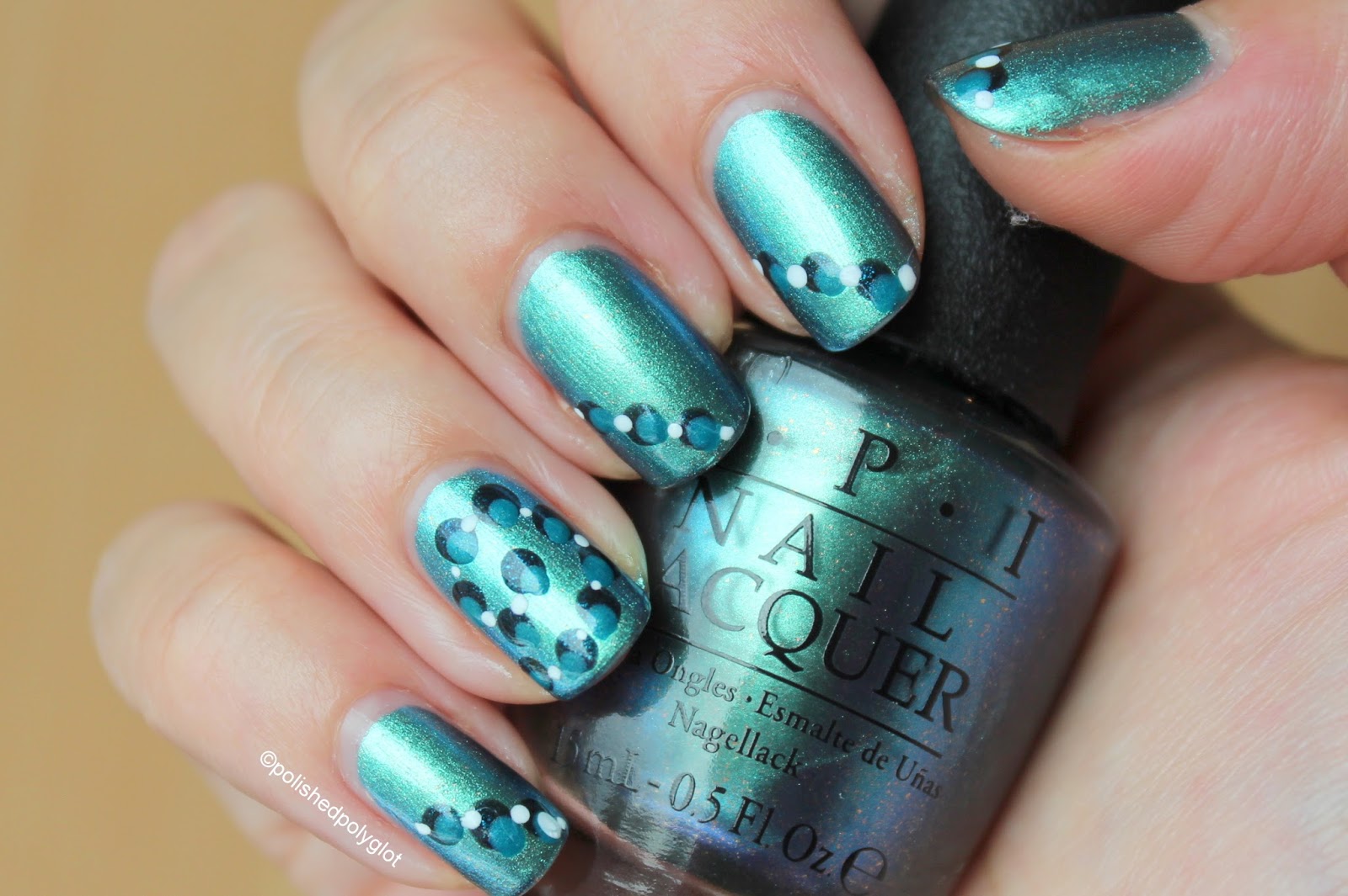 1. Teal and Gold Glitter Nail Design - wide 8