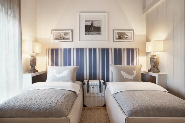 shared-kids-bedroom-two-beds-one-shared-headboard-gray-shark-pillow