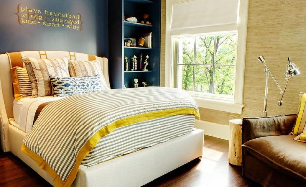 yellow-and-navy-boys-bedroom-bed-between-built-in-navy-bookcase