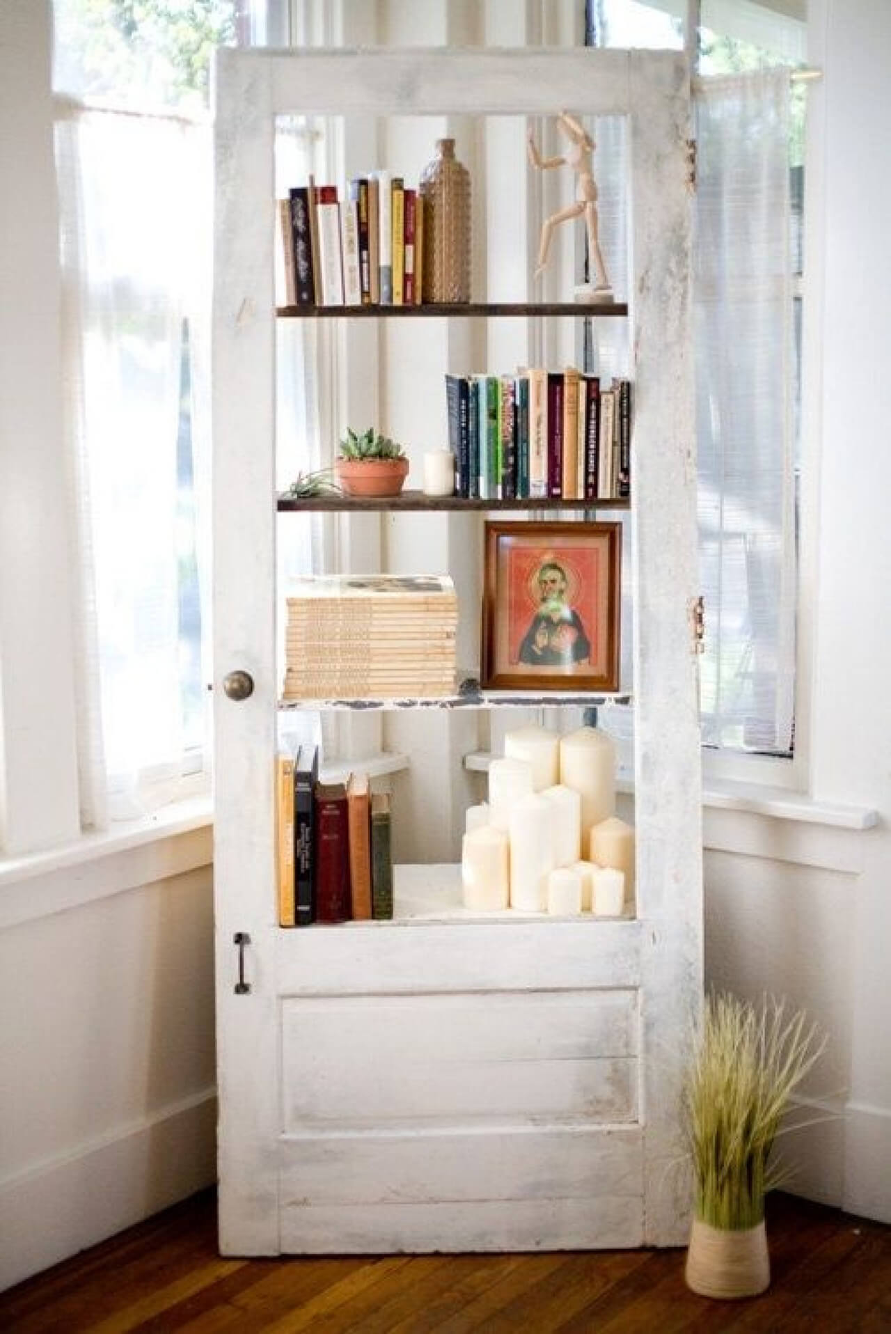 Repurposed Old Door Becomes Airy Ladder Bookcase
