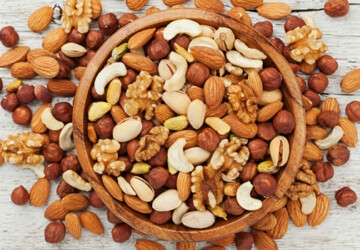 8 Healthy Fats You Should Be Eating - whole nuts, salmon, olives, olive oil, nuts, healthy fats, ground flaxseed, dark chocolate, Avocado