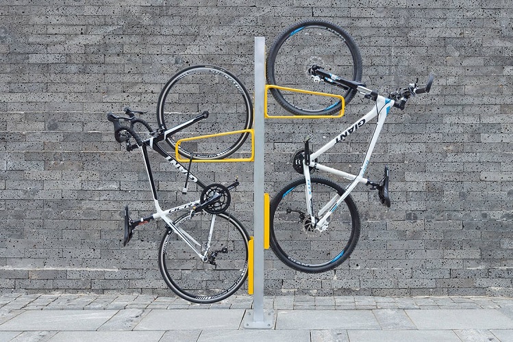 What You Need to Know About Different Types of Bike Racks - verticle racks, types, trunk mounted, truck bed, roof mounted, hanging racks, bike racks