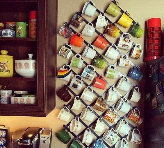7 Pretty Ways to Store Your Mugs - wall art, mug wall art, Mug, clothes hanger, clothes display, cabinet hooks
