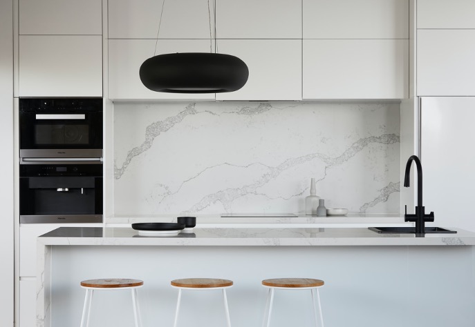 The Pros and Cons of Black Tapware - Are They Worth It? White marble kitchen with black tapware