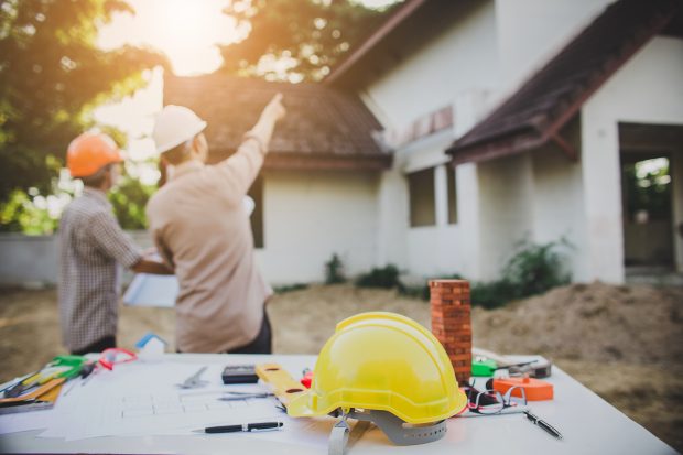 Engineer inspection in workplace for architectural plan Engineer inspection in workplace for architectural plan