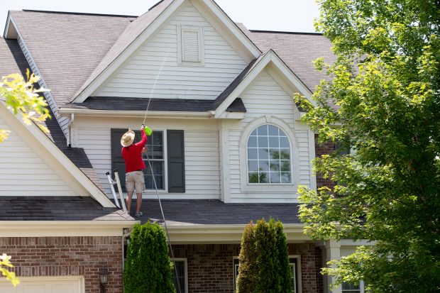 6 Signs Your Home Needs Intensive Exterior Cleaning - unkempt roof, patio, maintenace, filthy deck, exterior looks dirty, exterior, clogged gutters, cleaning, bugs and insects