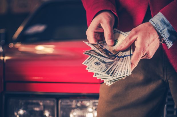 Cash Money For Your Car. Vehicle Selling and Buying Retro Concept. Automotive Industry. Cash Money For Your Car. Vehicle Selling and Buying Retro Concept. Automotive Industry.