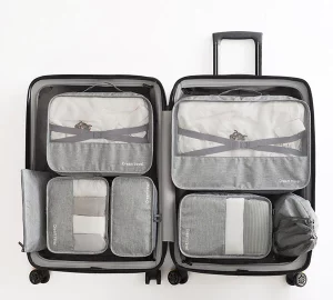 How to Keep Your Clothes Fresh When Traveling on Vacation - vacation, travel, suitcase, pack, organize, fabrics, dryer sheet, detergent